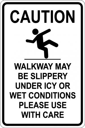 Caution. Walkway may be slippery under icy or wet conditions. Please use with care Sign. Black Font on White Background
